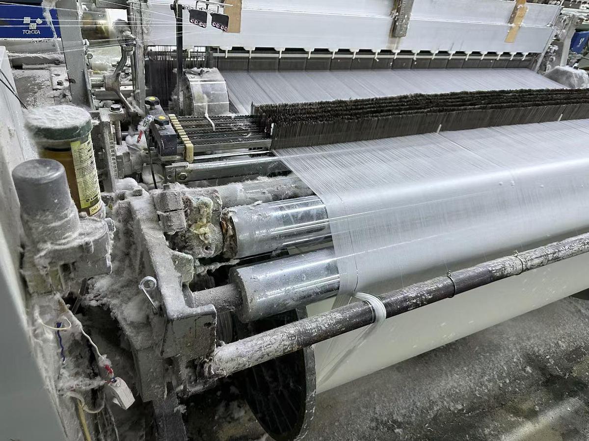 Used Toyota T610 air jet loom for fabric