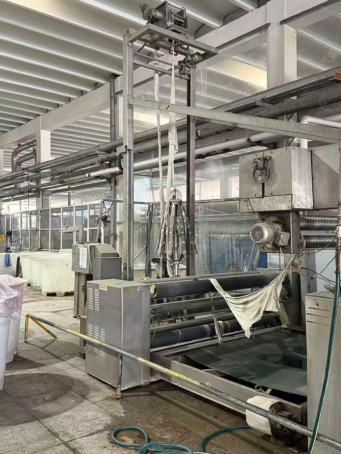 Used Bianco slitting machine for fabric