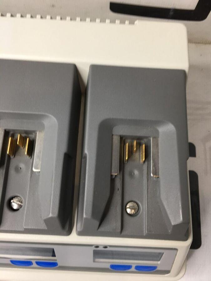 Used 611120 System W/ 4 Charging Bays TESTED