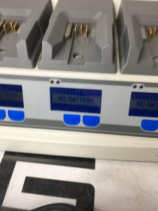 Used 611120 System W/ 4 Charging Bays TESTED