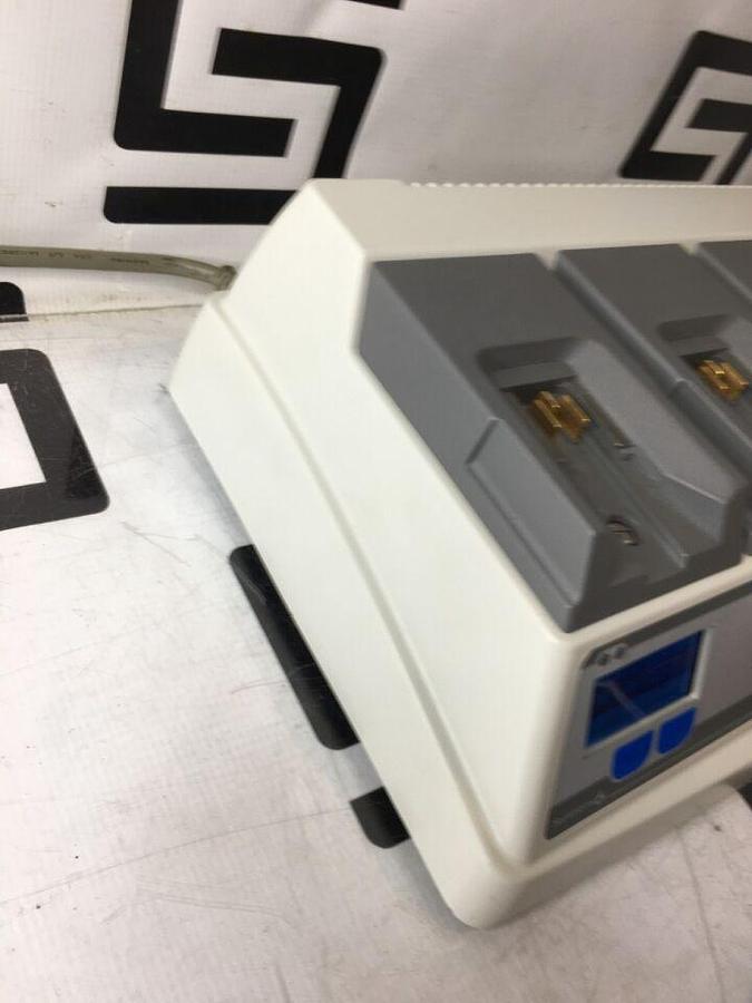 Used 611120 System W/ 4 Charging Bays TESTED