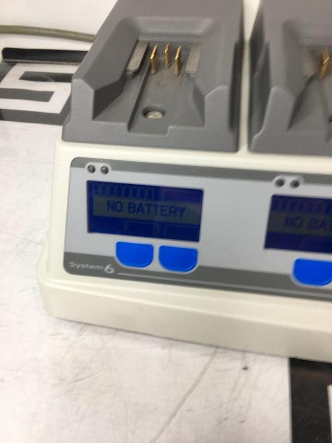 Used 611120 System W/ 4 Charging Bays TESTED