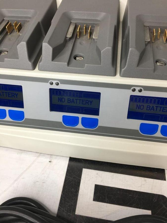 Used 611120 System W/ 4 Charging Bays TESTED