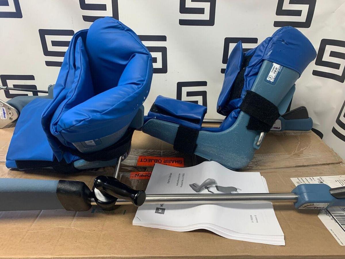 Used Stirrup Set Left   Right   Integrated Surgical Table Clamp