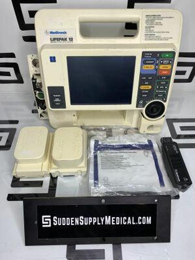 Used MEDTRONIC/PHYSIO-CONTROL Lifepak 12 Defibrillator VLP12-02-003486 Batteries, Electrodes, Test Load