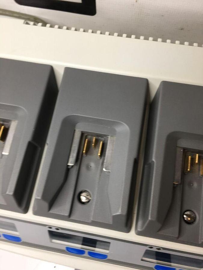 Used 611120 System W/ 4 Charging Bays TESTED