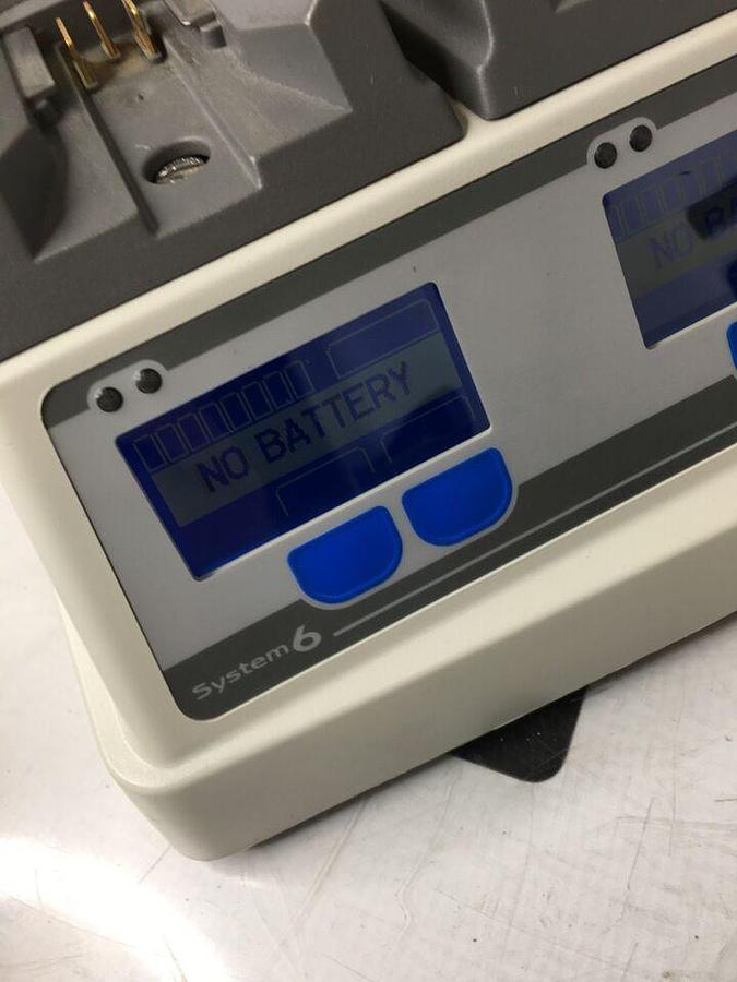 Used 611120 System W/ 4 Charging Bays TESTED