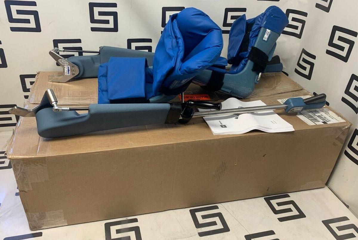 Used Stirrup Set Left   Right   Integrated Surgical Table Clamp