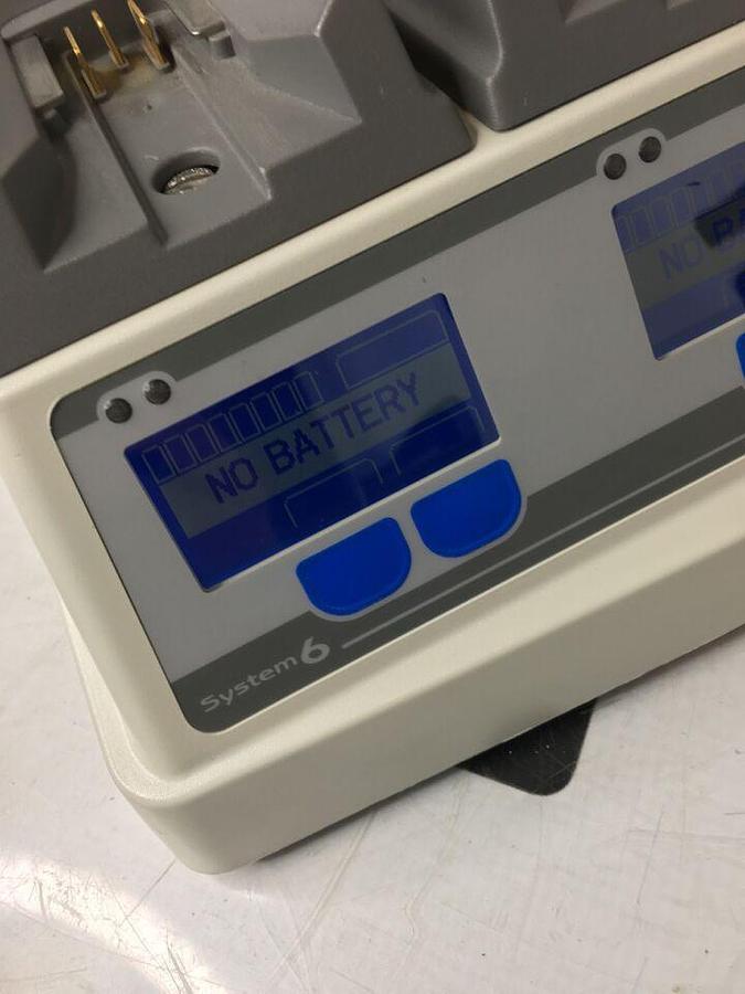Used 611120 System W/ 4 Charging Bays TESTED