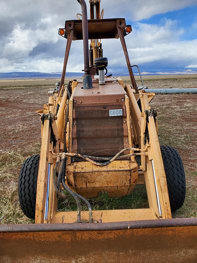 Used Case 580SE Backhoe w/ Attachments
