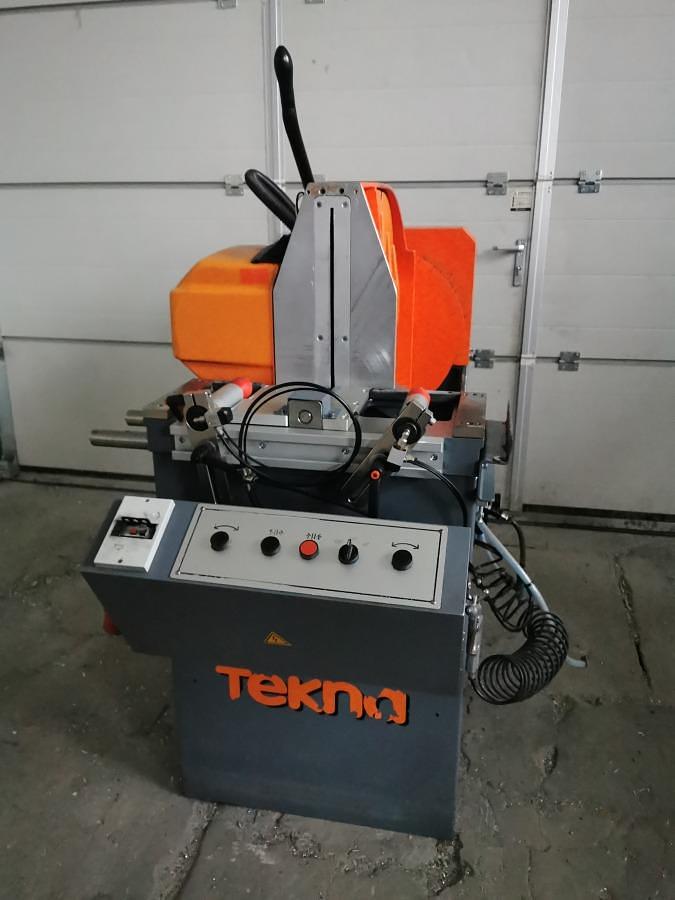 Used TEKNA TK 123 P SINGLE HEAD SAW YEAR 2007 PLUS FEEDER AND RECEIVER