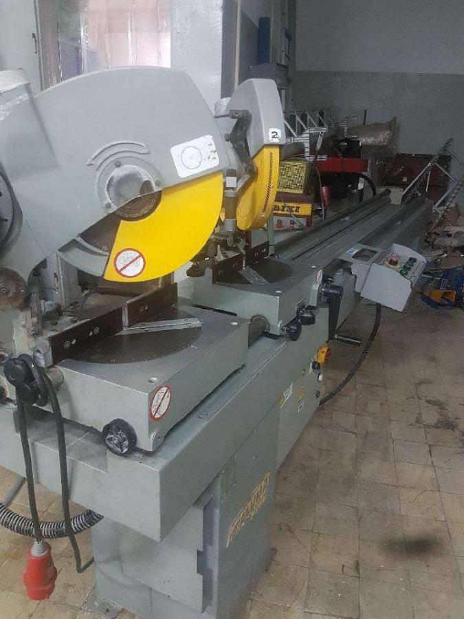 Used DOUBLE-HEADED SAW ALUMA/UNIVER 332P YEAR 1999