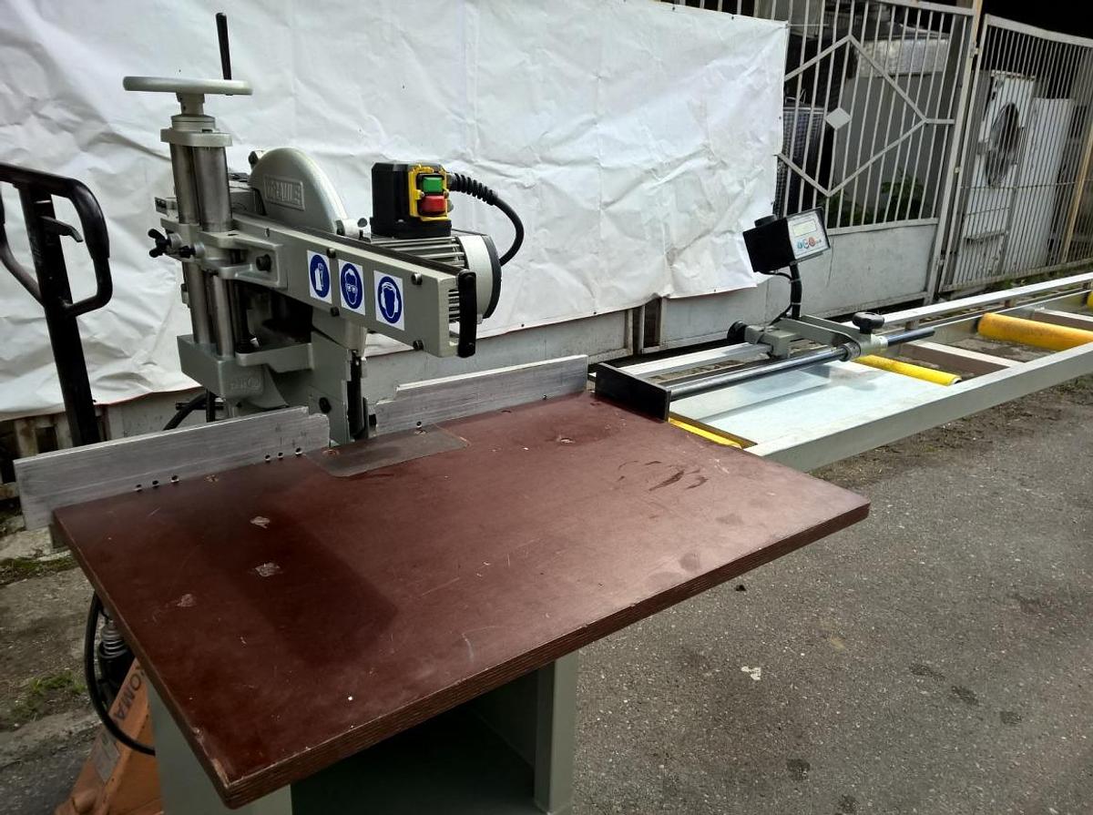 Used SINGLE HEAD GRAULE SAW ZS 85 NS FOR PVC AL AND WOOD + ELECTRONIC GAUGE WITH ELGO ROLLER CONVEYOR YEAR 1996 (TABLE YEAR 2006)