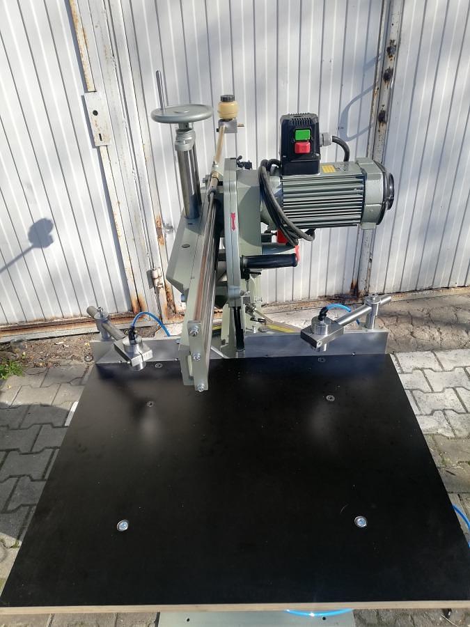 Used SINGLE HEAD GRAULE SAW ZS 135 N WITH TABLES