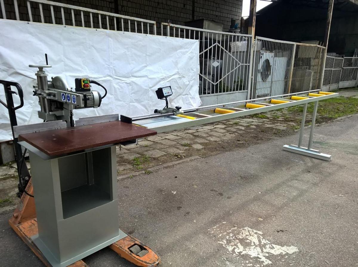 Used SINGLE HEAD GRAULE SAW ZS 85 NS FOR PVC AL AND WOOD + ELECTRONIC GAUGE WITH ELGO ROLLER CONVEYOR YEAR 1996 (TABLE YEAR 2006)