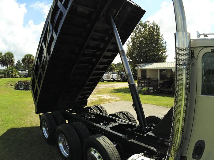 Used 2016 CATERPILLAR FACTORY DUMP TRUCK