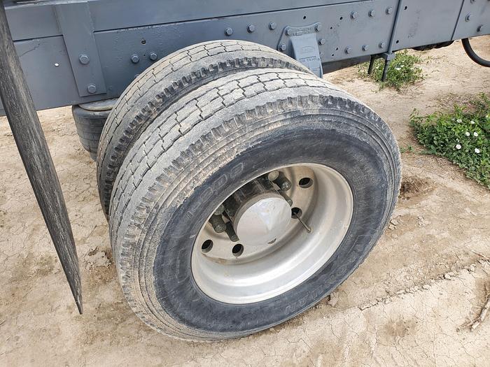 Used 1990 Peterbilt w/ New Holland 1051 Stack Retriever