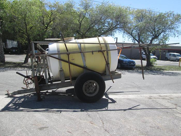 Used 1000 Gallon Pull Behind Boom Sprayer