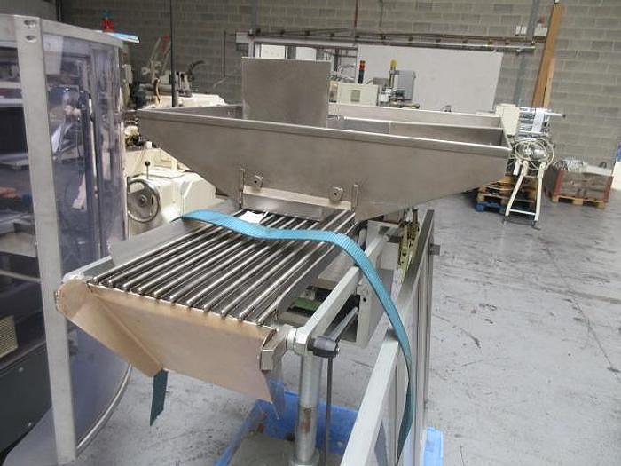 Usado B E envolvedora de huevos o bolas de chocolate con doble torsión Carle Montanari