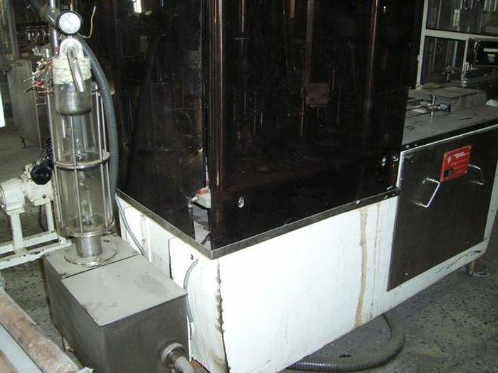 Usado maquina dosificadora de líquidos MECANO-QUIMICA por sistema de vacío