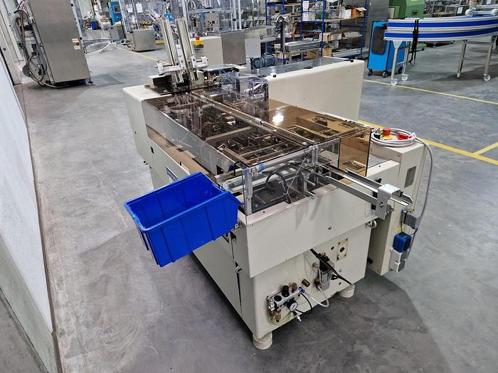 Usado A Linea llenadora, cerradora y empacadora de tubos 