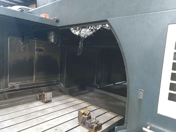 Used 2005 Johnford Bridge Style Vertical Machining Center, Model DCM 2100SH, Table 60" X 86", X Travel 81", Y Travel 72", Z Travel, 31.5", Distance under Rail 37.5", 10,000 RPM, 30HP, ASH A63 tooling, Fanuc CNC.5,