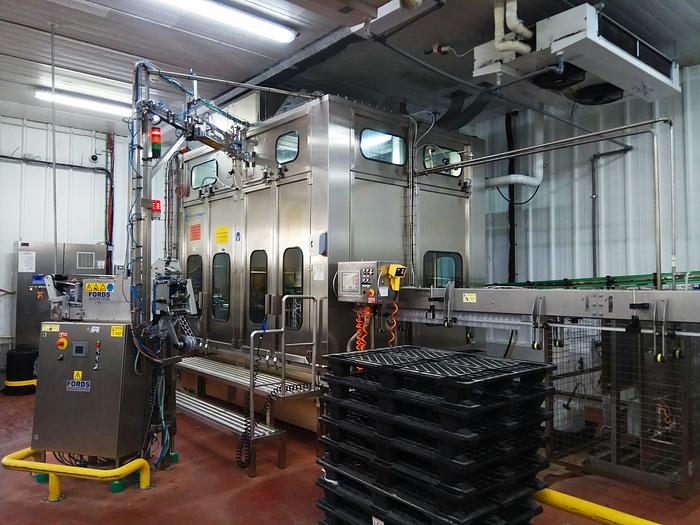 Used WEIGHTPACK BOTTLE FILLING MACHINE WITH FOIL CAP