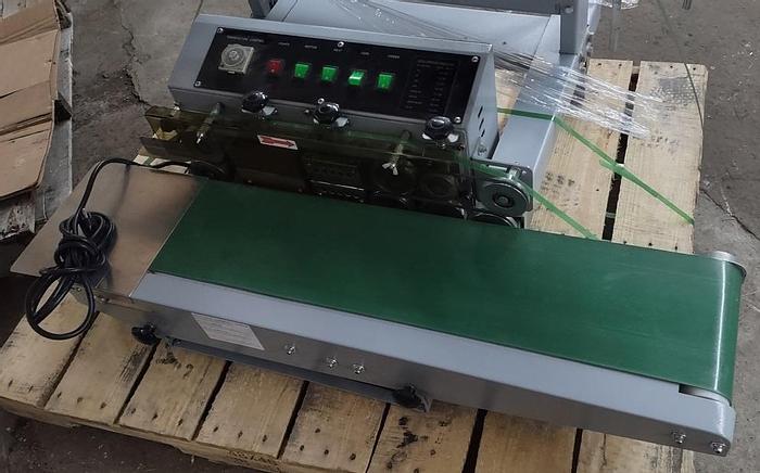 Used Horizontal Table top band sealer