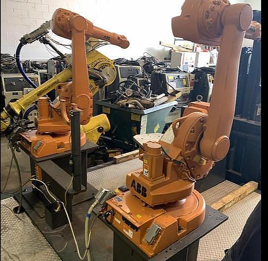 Used ABB IRB 1600-5/1.45 DUAL ARM ROBOTIC CELL WITH ABB TYPE MTC 750 POSITIONER AND IRC5 CONTROLLERS