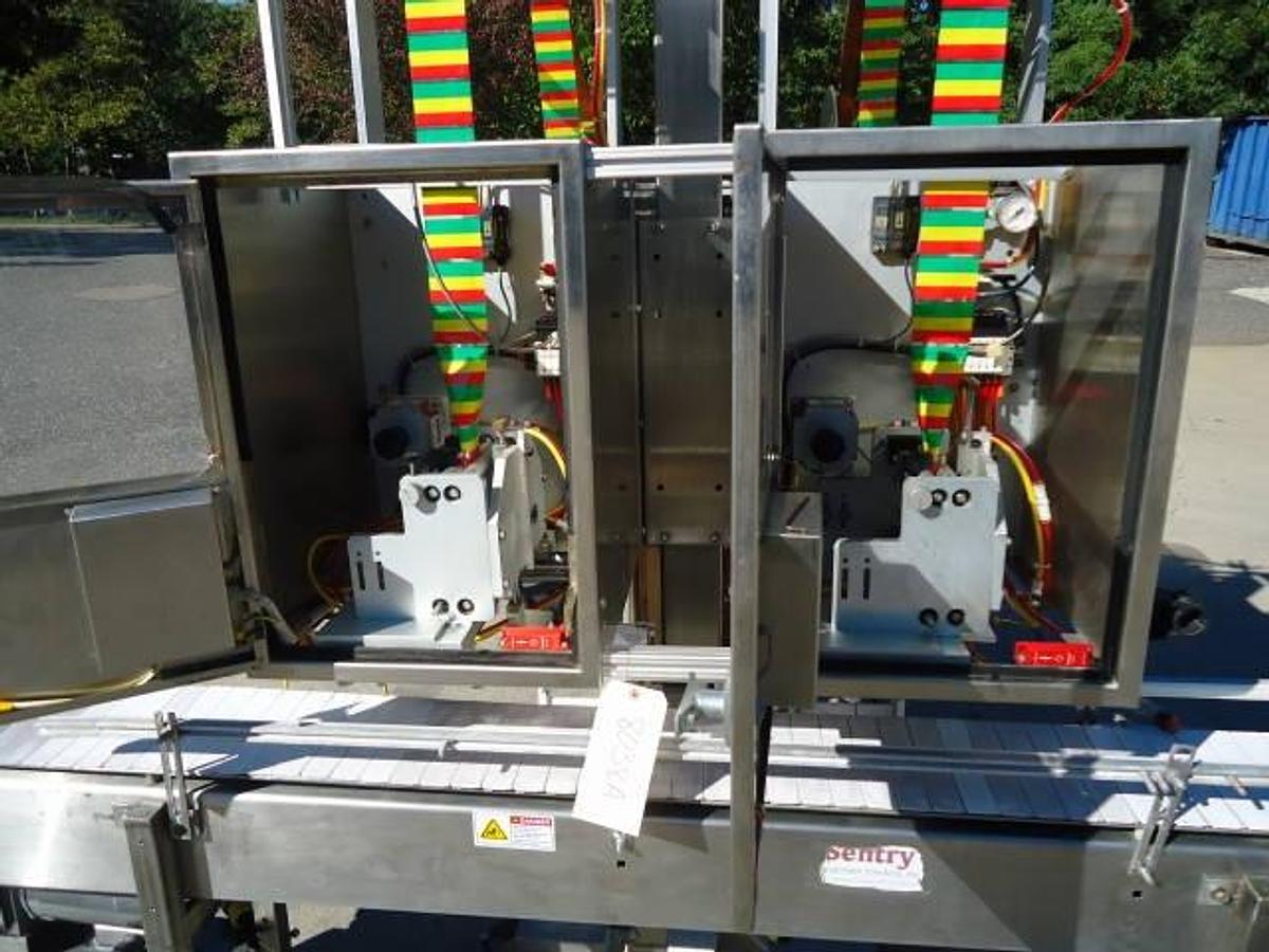 Used Axon EZ-2-200 Dual Station Tamper Evident Neck Bander/Sleever