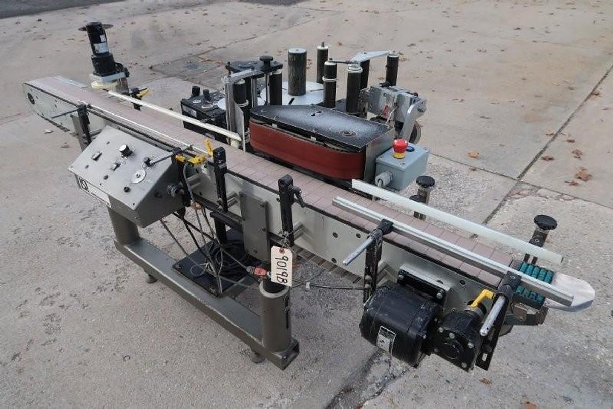 Used LSI Auto Pressure Sensitive Wraparound Labeler with Coder