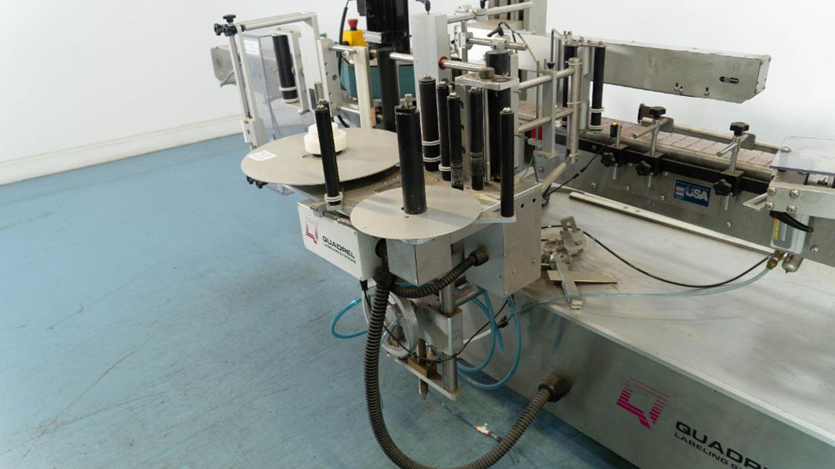 Used Quadrel VersaLine Spot/Wraparound Pressure Sensitive Labeler