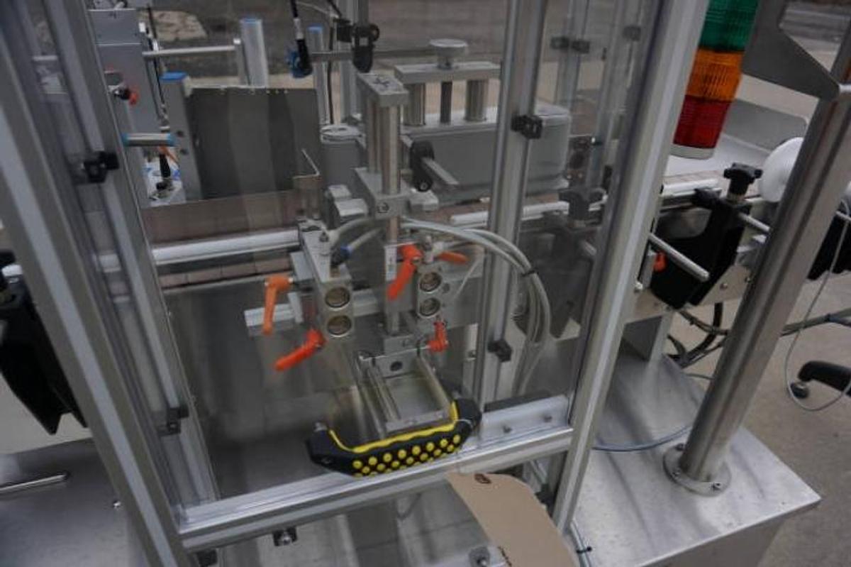 Used Aesus Systems “Eco Wrap Prism” Automatic Pressure Sensitive Spot/Wrap Around Labeler, Stainless Steel