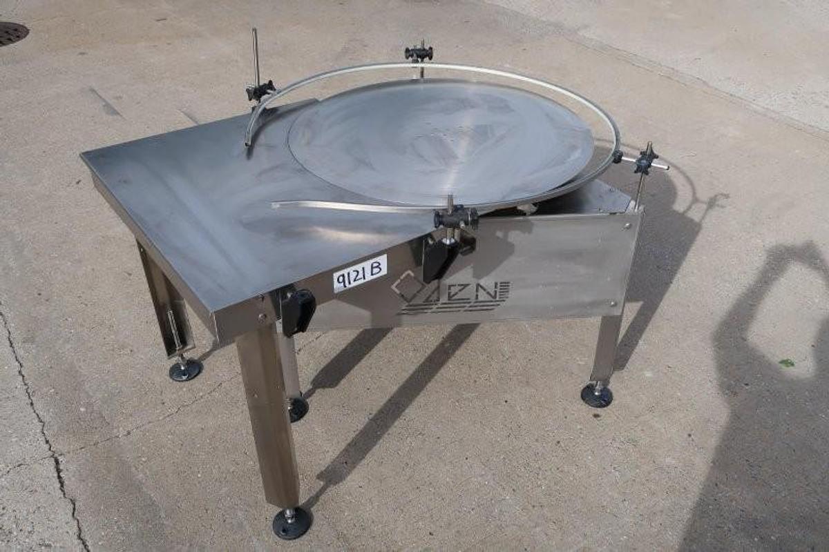 Used Oden 36 In. Diameter Rotary Unscrambling/Accumulating Table, with Shelf