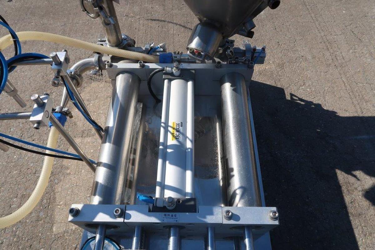Used Dual Head Tabletop Piston Filler, 3 In. Wide X 15 In. Long Pistons