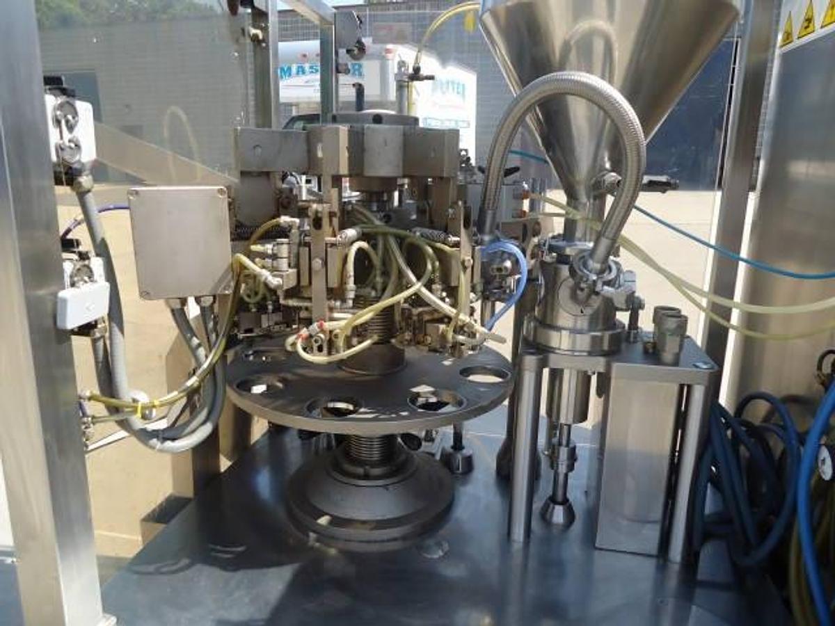 Used Unipac/Romaco Silver 80e Plastic Tube Filling And Sealing Machine, 80 Per Minute