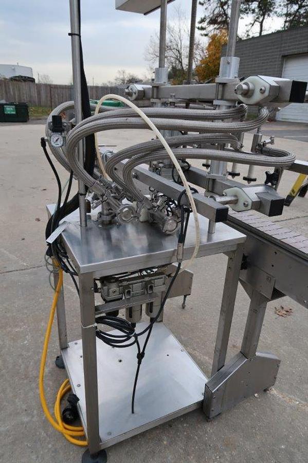 Used Inline Filling Systems 4 Spout Overflow Straight Line Liquid Filler, Stainless Steel