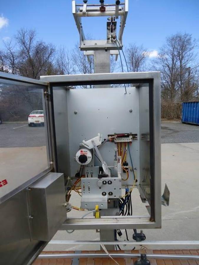 Used Axon Ez-130 Automatic Sleever/Neck Bander With Tunnel