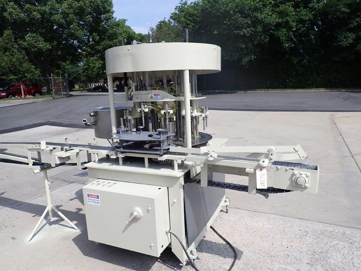 Used New Way 12 Spout Rotary Pressure Gravity Liquid Filling Machine, 8-1/4 In. Centers