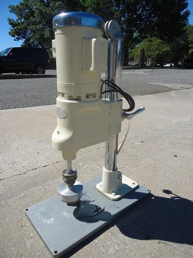 Used Swanmatic 49PC Bench Top Semi-Automatic Capper, Single Phase