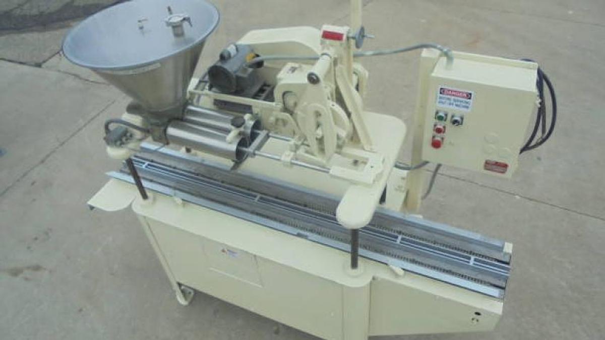 Used MRM Elgin Twin Piston Automatic Filler, 97 Ounce Pistons
