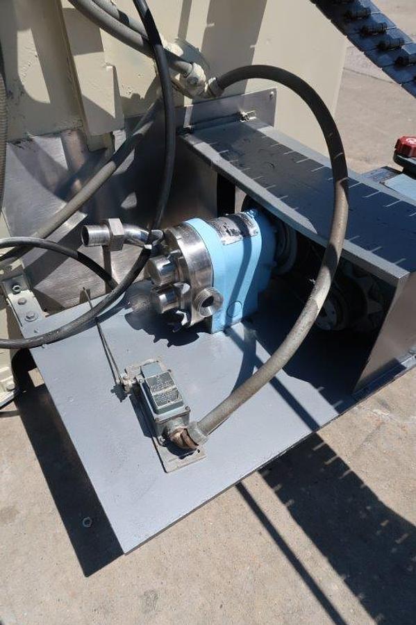 Used MRM “Versa-Fil” Six Head Rotary Time and Pressure Positive Displacement Filling Machine, with Waukesha Pump