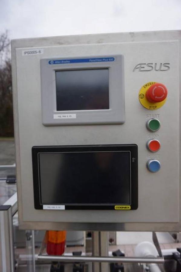 Used Aesus Systems “Eco Wrap Prism” Automatic Pressure Sensitive Spot/Wrap Around Labeler, Stainless Steel