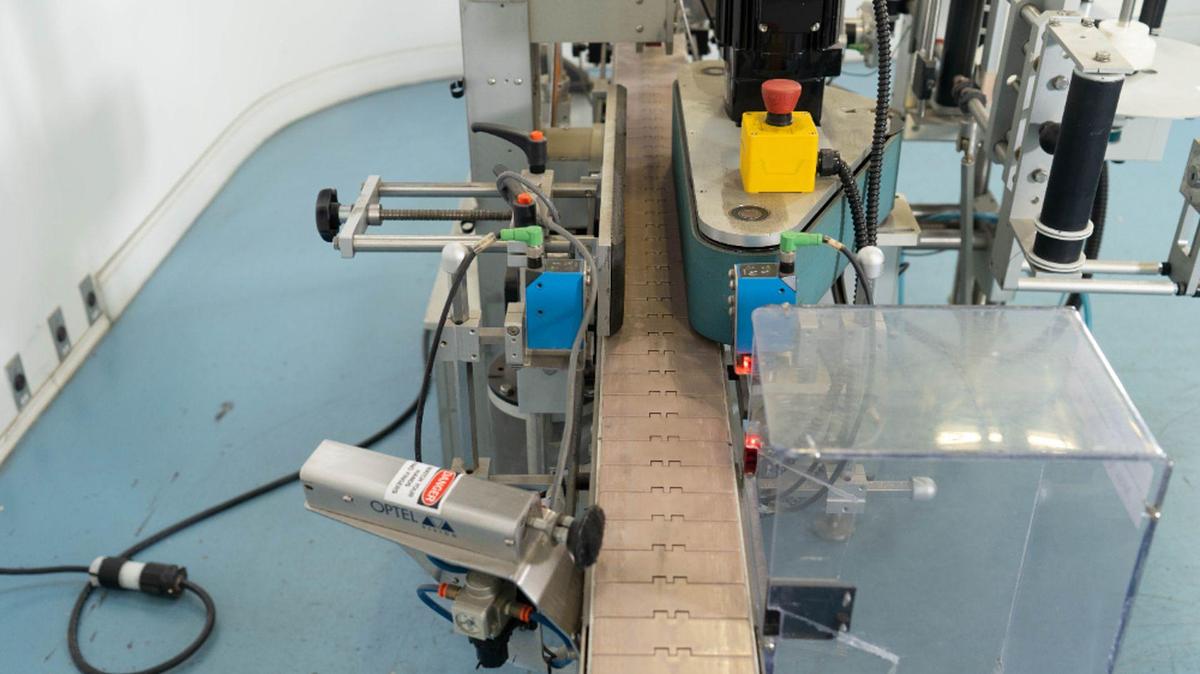 Used Quadrel VersaLine Spot/Wraparound Pressure Sensitive Labeler