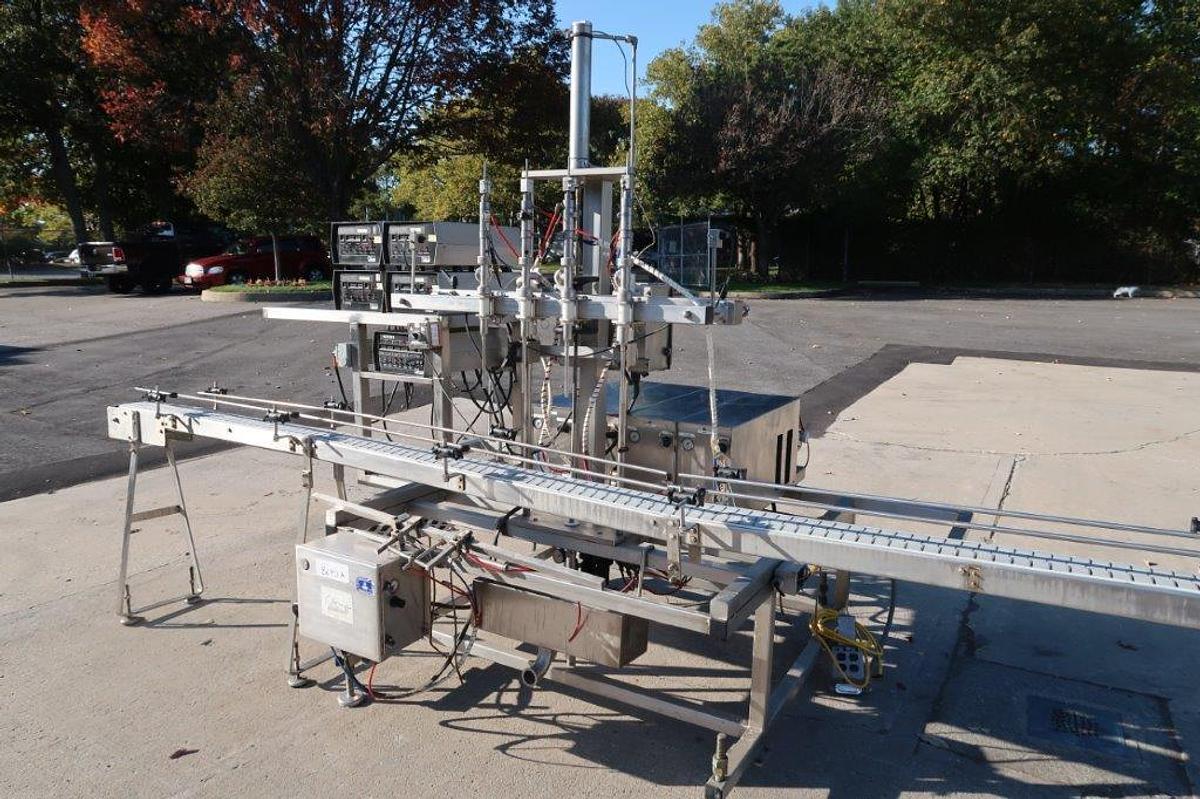 Used Oden Four Head Pump Style Positive Displacement Filler