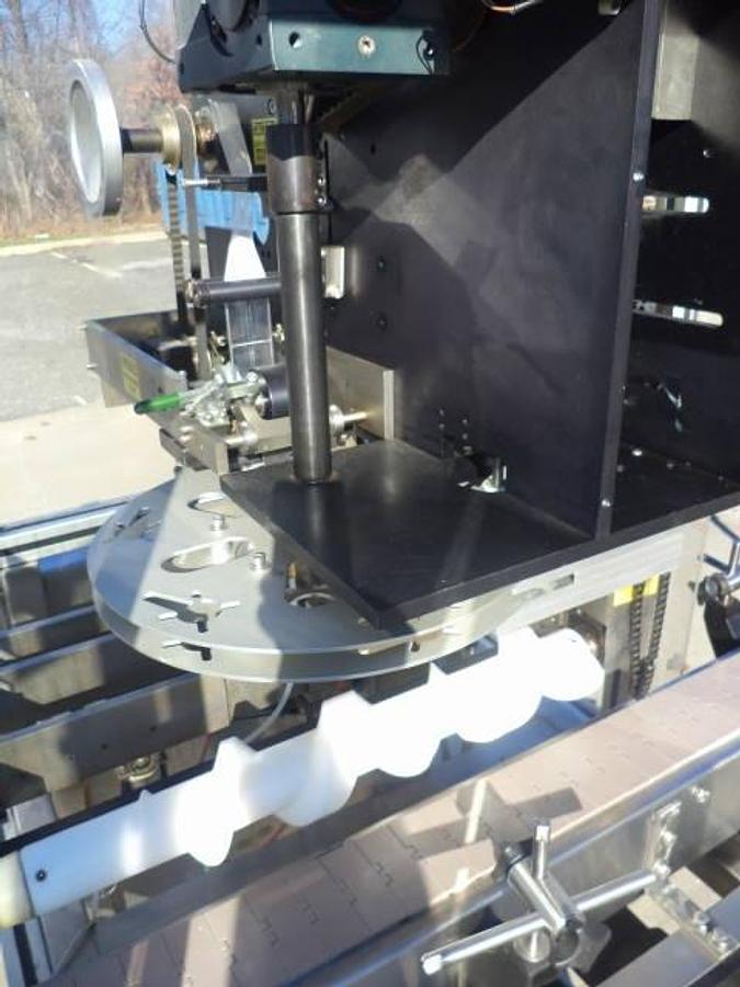 Used PDC 65-M Tamper Evident Neck Bander/Sleever, 200 pm