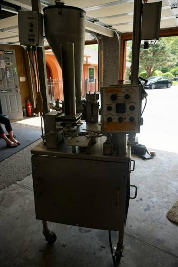 Used World Cup Model 8-12 Rotary Cup Filling/Sealing Machine, 45 Per Minute