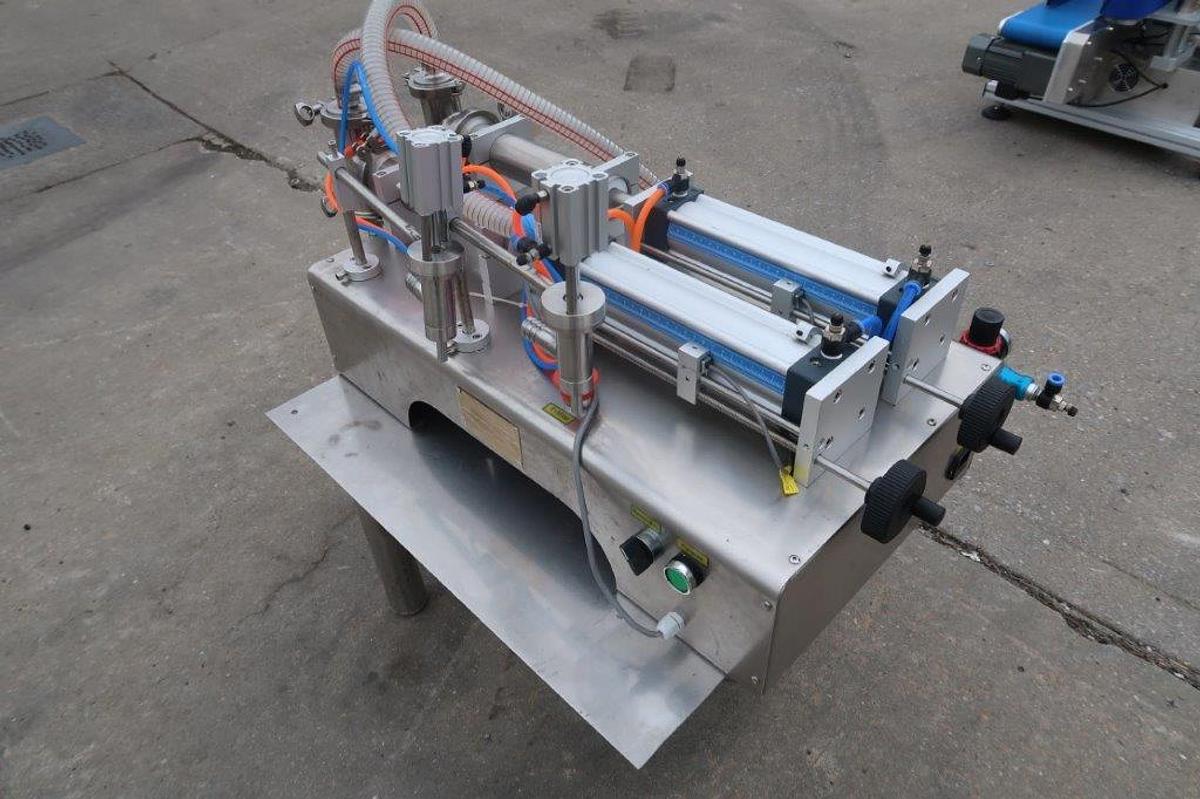 Used Quantitative Tabletop Dual Head Piston Filler, Air Operated