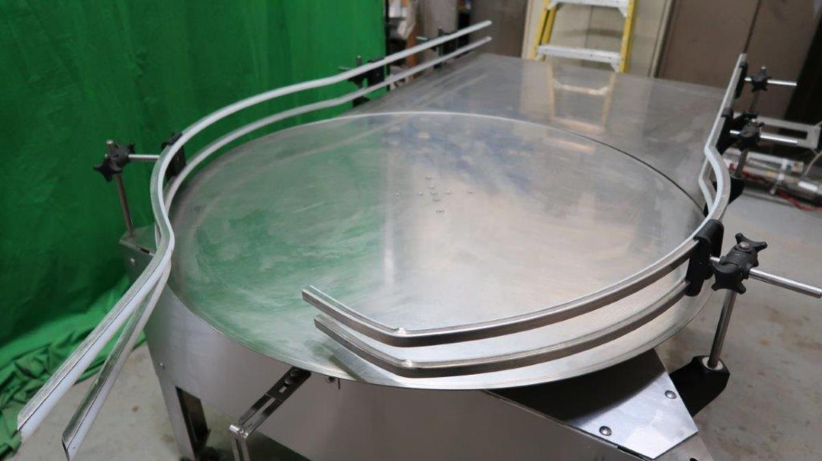 Used 40 In. Diameter E-PAK Stainless Steel Rotary Unscrambling/Accumulating Table with Shelf