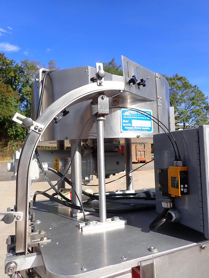 Used Kaps-All Model C Automatic Eight Spindle Capper, 200 Per Minute